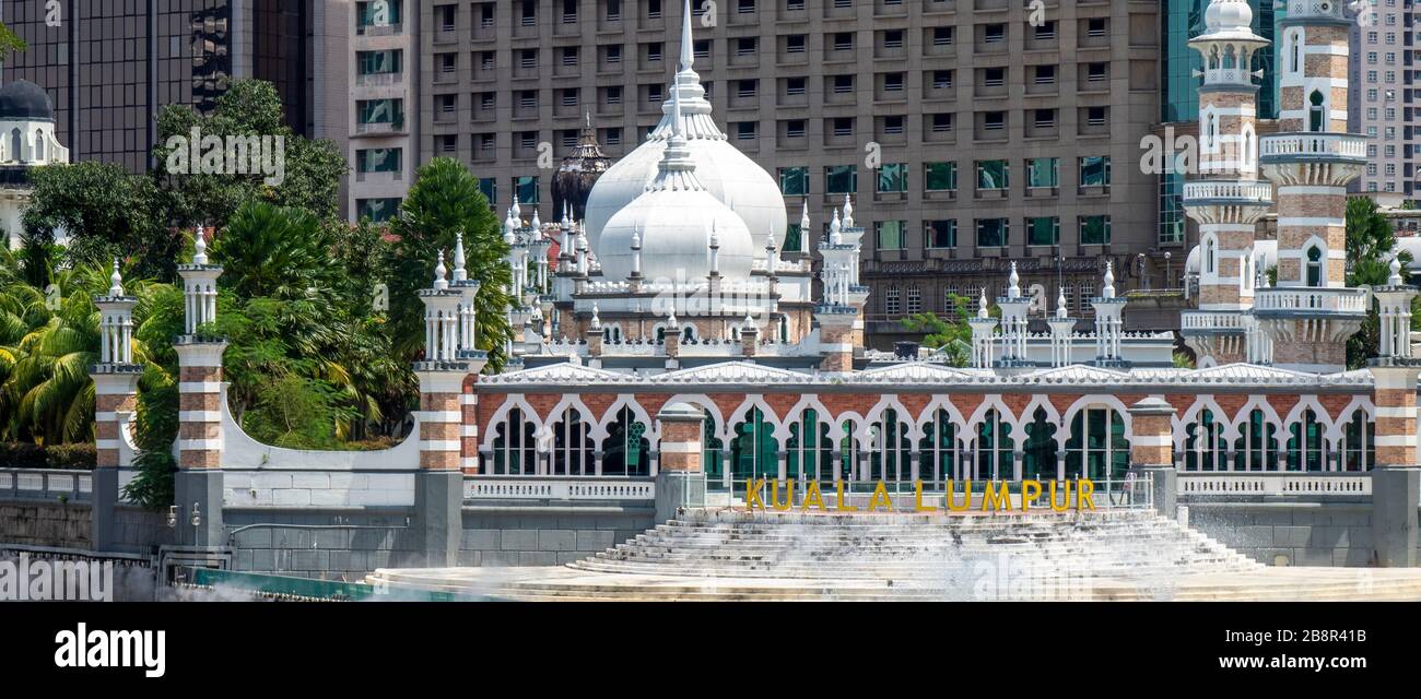 Jamek Mosque Arthur Benison Hubback architect at confluence of Sungai Gombak and Sungai Klang rivers River of Life walkway Kuala Lumpur Malaysia. Stock Photo