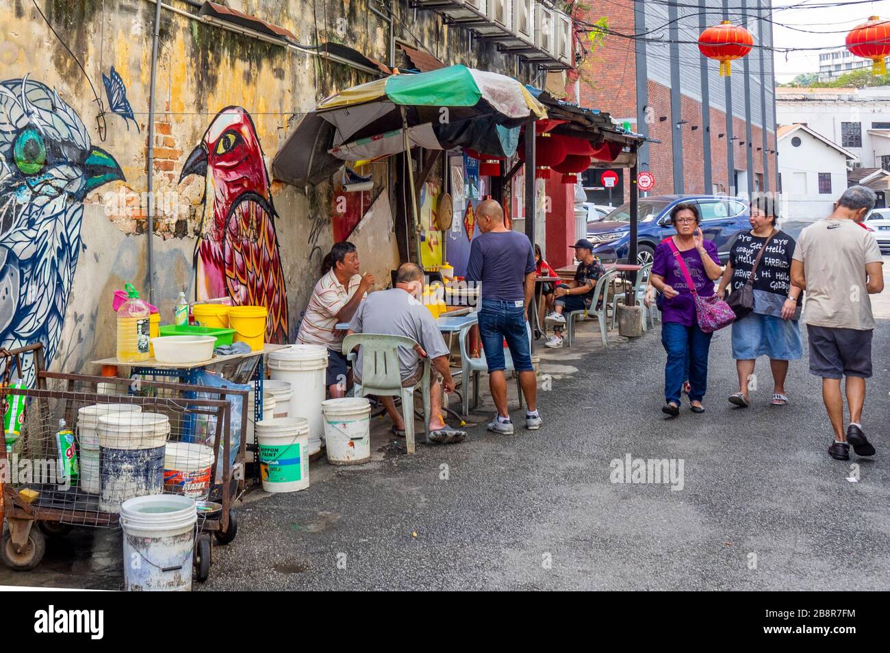 Tourists and diners in laneway Lorong Panggung Chinatown City Centre Kuala Lumpur Malaysia. Stock Photo