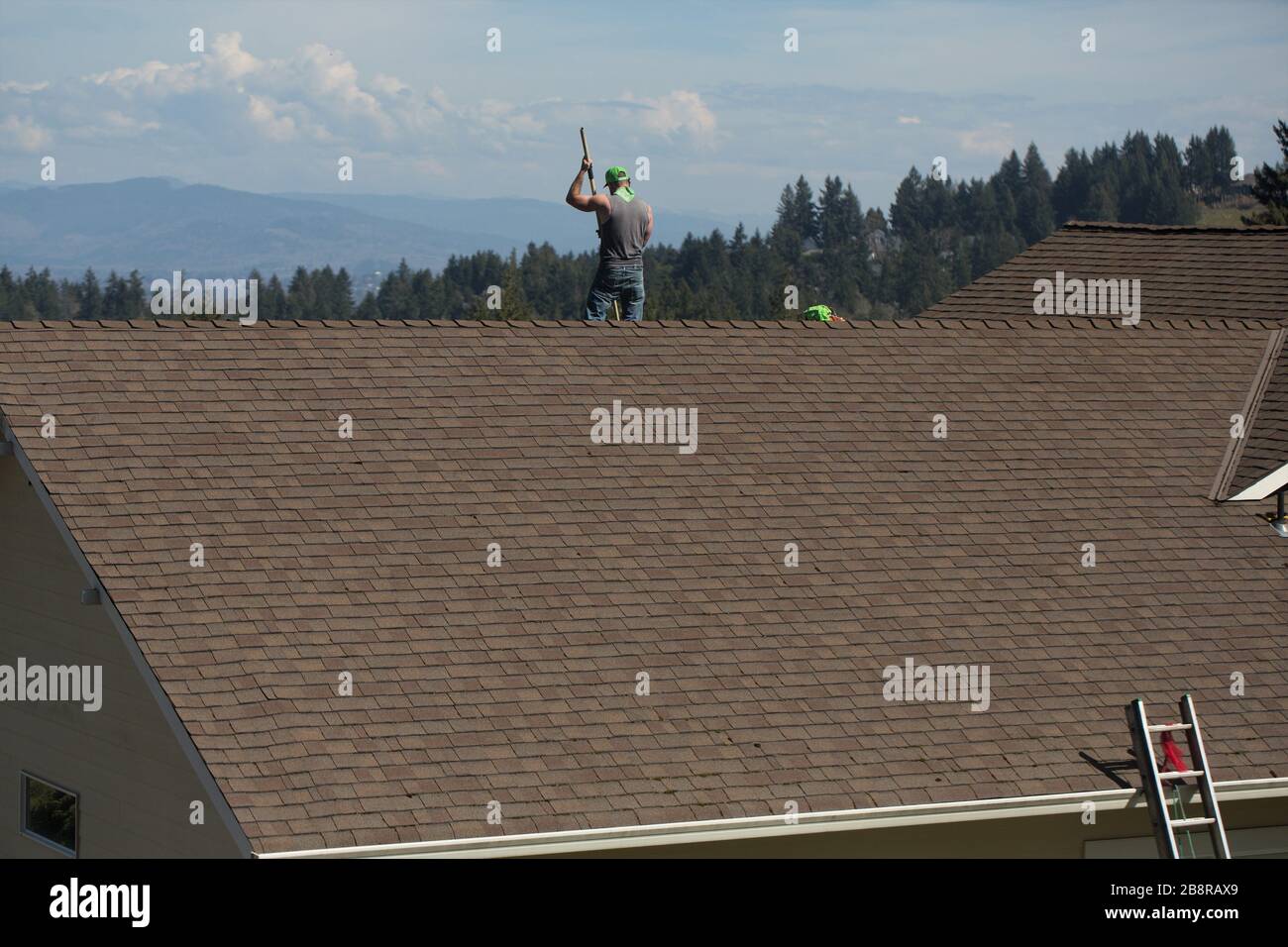 Cleaning roof hires stock photography and images Alamy