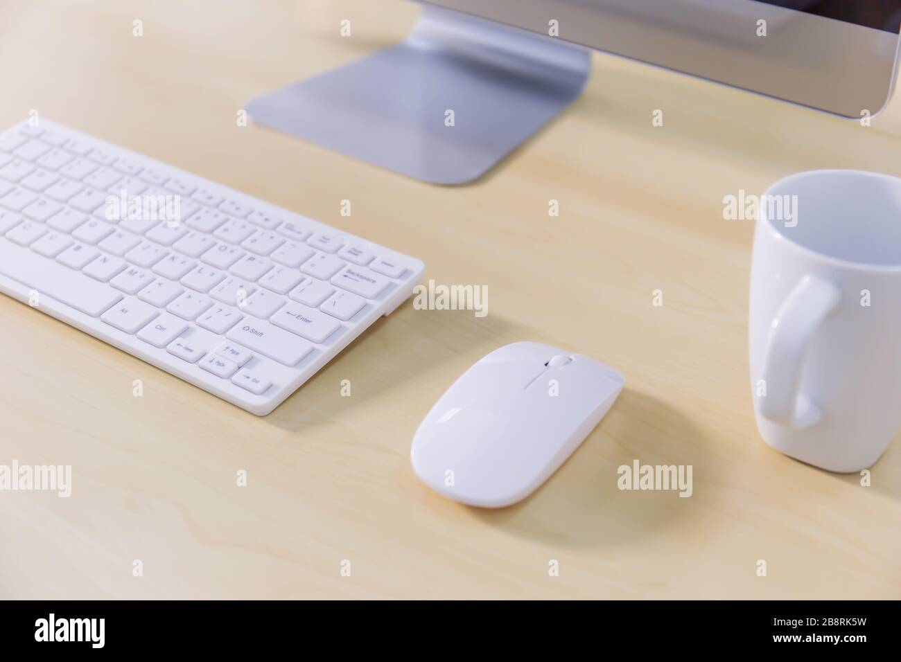 Office desk table with computer and coffee cup. Top view Stock Photo