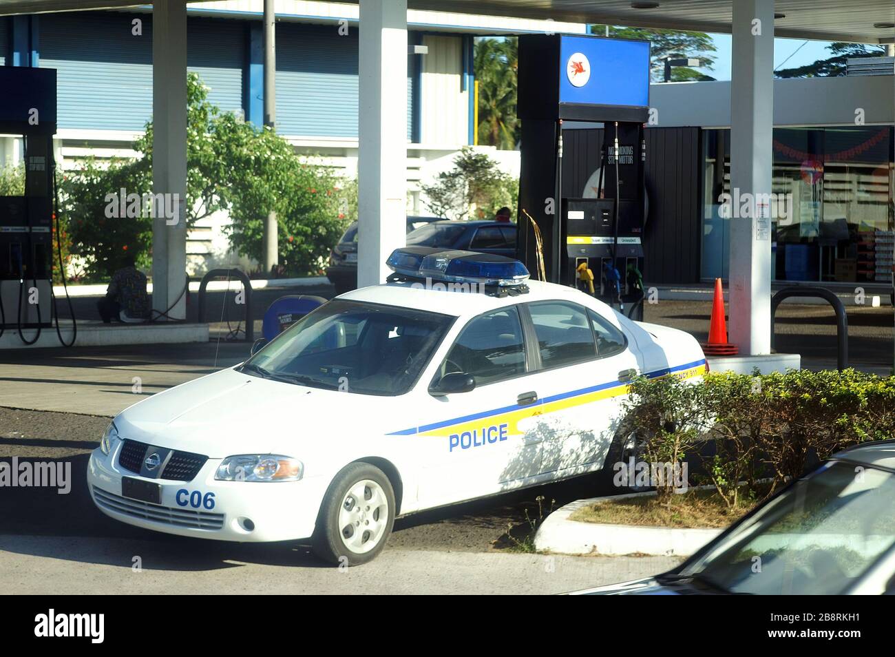 Palau, FEB 25, 2005 - Police car is leaving from a gas station Stock Photo