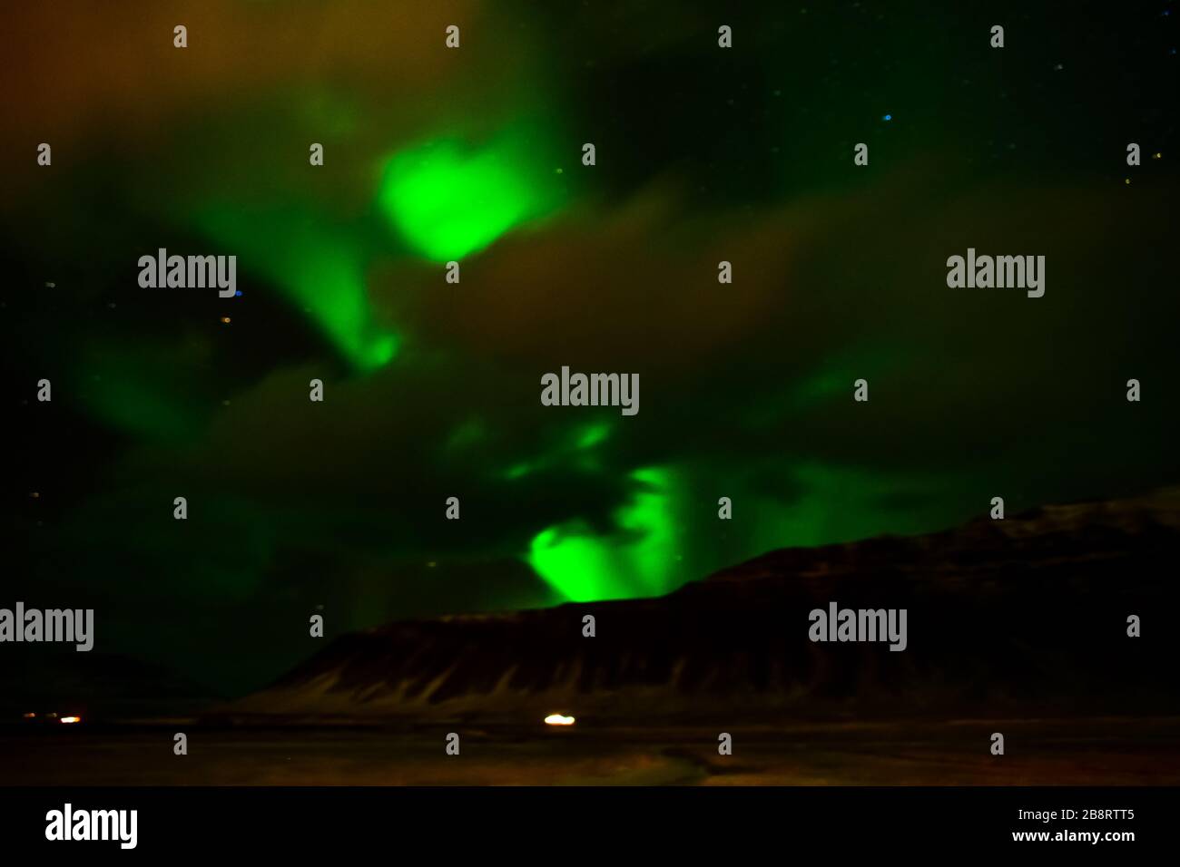 A strong northern lights showing above Grundarfjörður Stock Photo Alamy