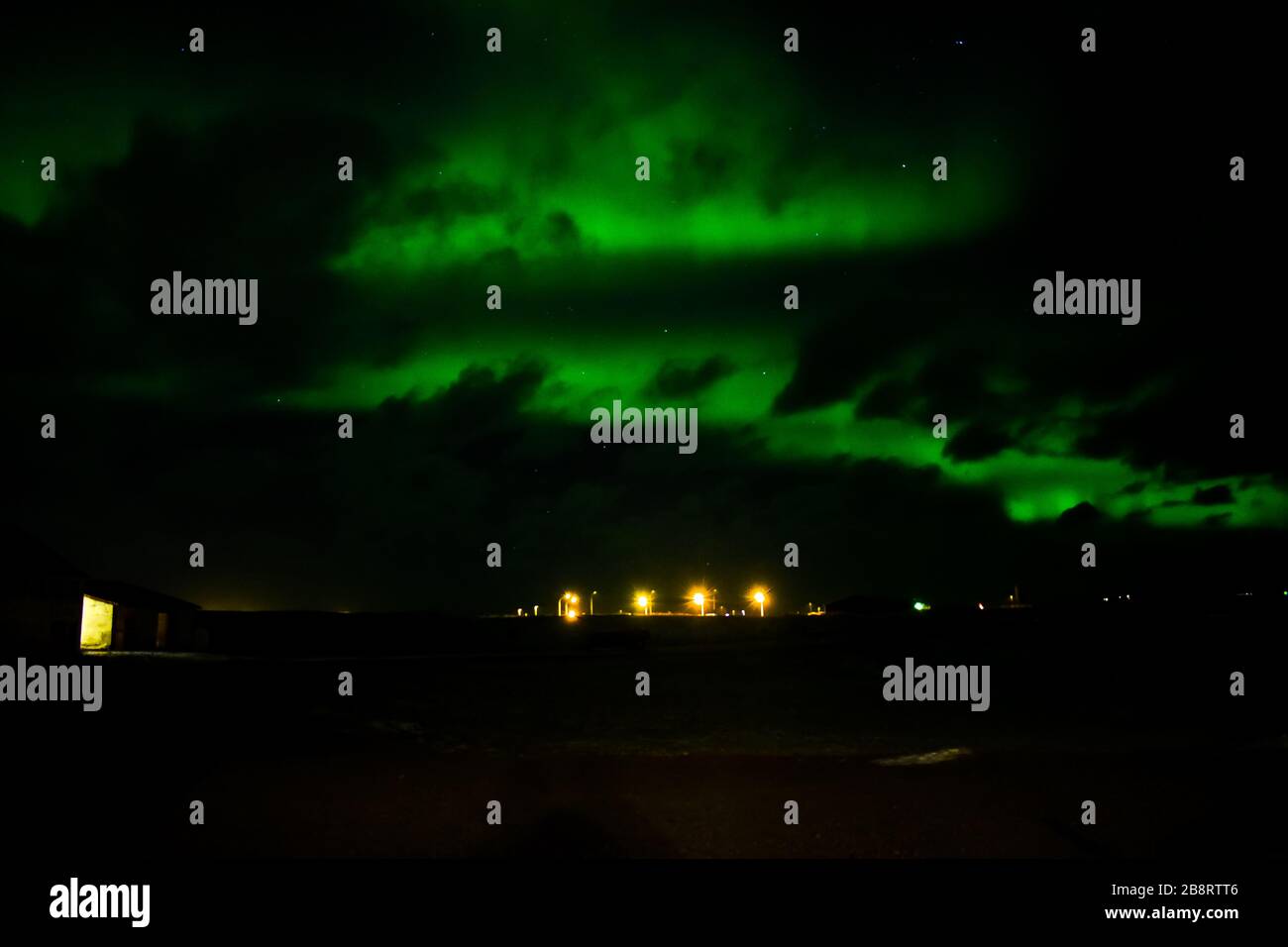 A strong northern lights showing above Grundarfjörður Stock Photo Alamy