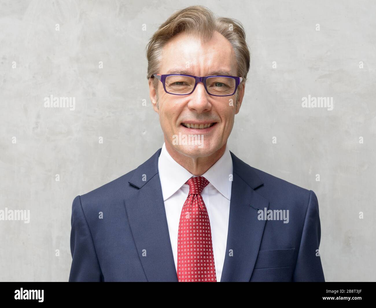 Face of happy handsome mature businessman with eyeglasses smiling ...