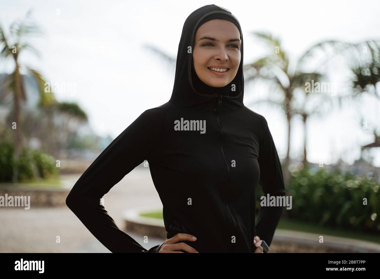 beautiful sport muslim woman smiling. healthy woman with scarf