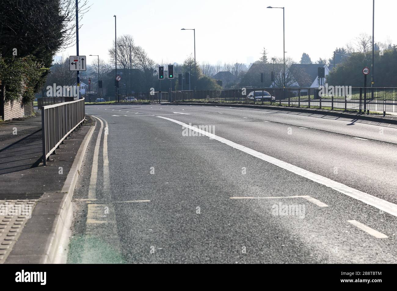 Birmingham, West Midlands, UK. 23rd Mar, 2020. Birmingham's arterial commuter routes are very quiet on the first Monday morning after people are staying at home. The Hagley Road is normally clogged with traffic. Credit: Peter Lopeman/Alamy Live News Stock Photo