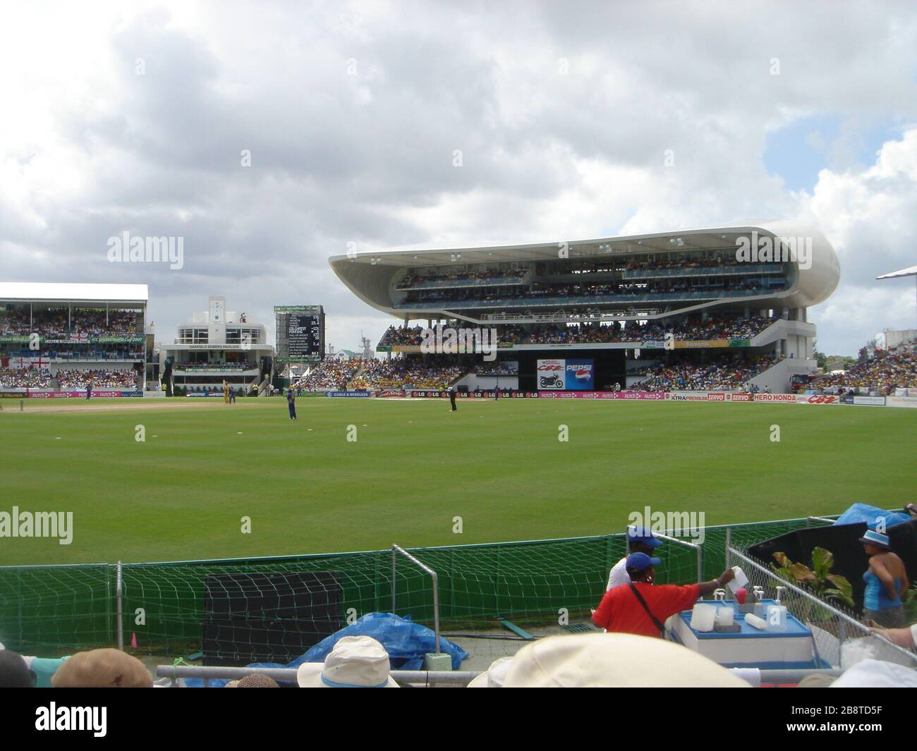 'English: This is an image of the Kensington Oval, Bardados taken during on the day of the 2007 World Cup Cricket Final. Featured on the right is the Worrell, Weekes and Walcott stand, a most dramatic and impressive structure. I am the photographer.; 2 May 2007 (original upload date); Transferred from en.wikipedia to Commons by Trengarasu using CommonsHelper.; ROxBo at English Wikipedia; ' Stock Photo