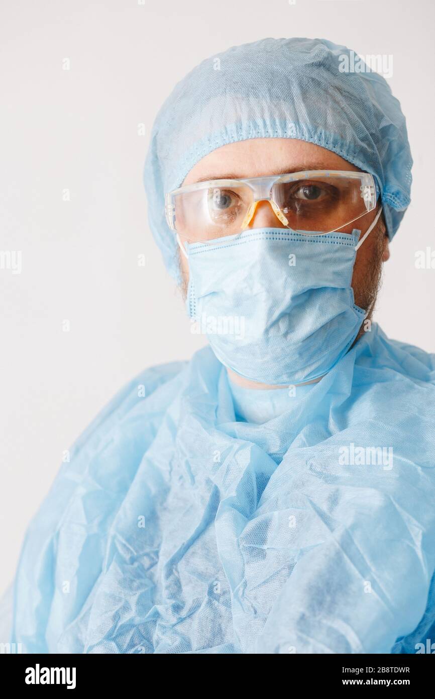 Close up of doctor with mask. Medical equipment. A doctor wearing personal protective equipment including mask, goggle, and suit to protect COVID 19 c Stock Photo