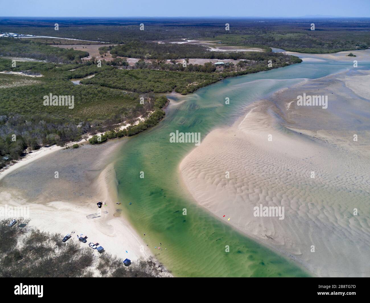 Aerial of white silica sands of Theodolite Creek near Woodgate Beach