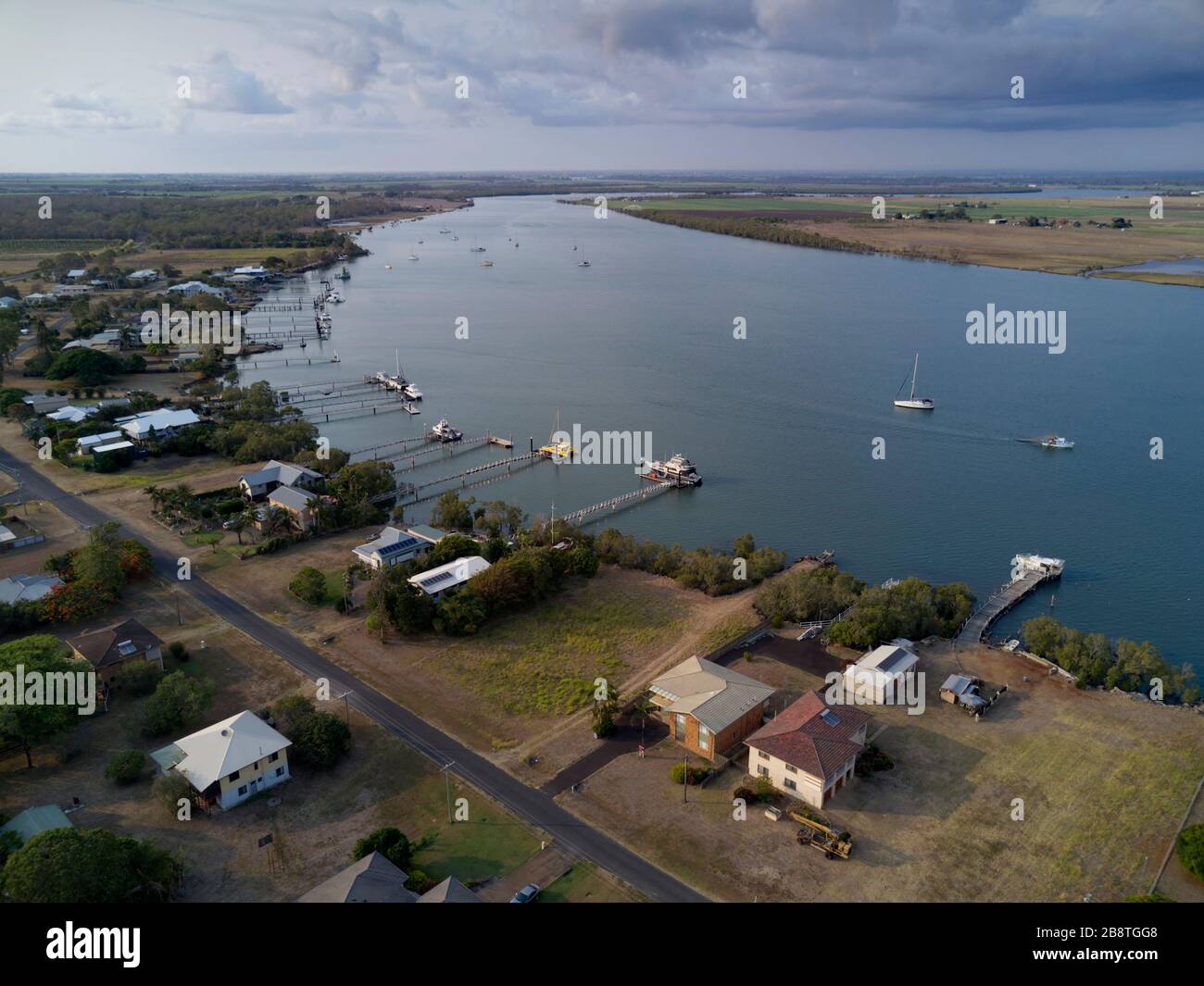 Aerial of waterfont houses complete with private boat jetties on the