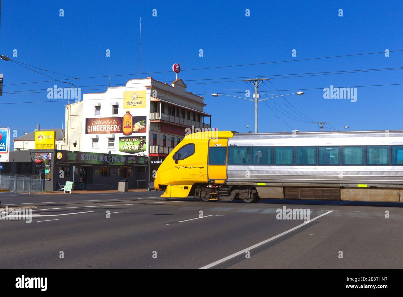 Queensland Rail Tilt train crossing Bourbong Street at Bundaberg