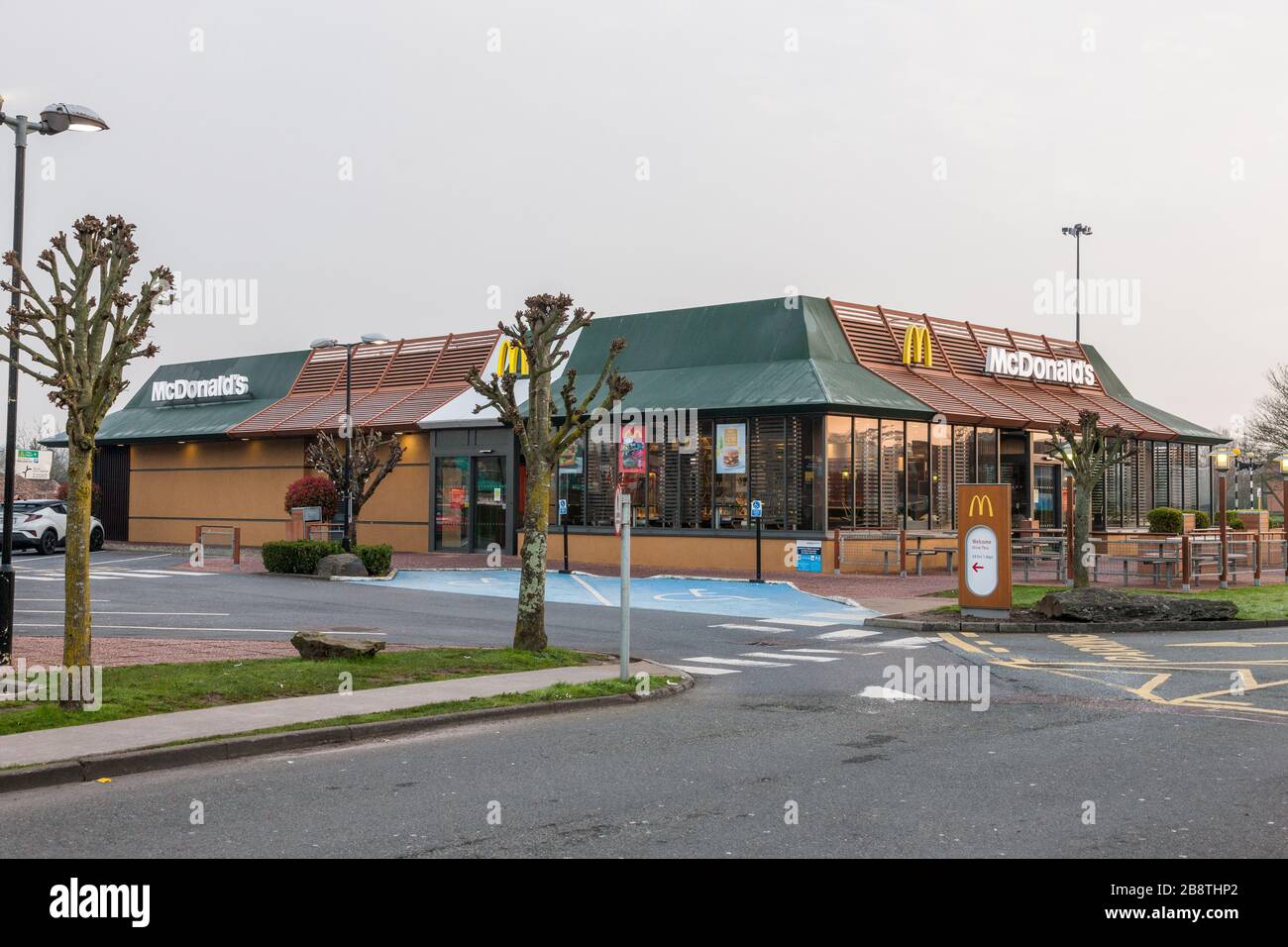 Douglas, Cork, Ireland. 23rd March, 2020. All McDonald’s restaurants which employ 135,000 workers in the UK and Ireland will close by 7pm on Monday to protect the safety of its employees and customers due to the Coronvirus Covid-19 emergency. Picture shows the McDonald's restaurant and Drive-thru in Douglas, Cork, Ireland.  Credit; David Creedon / Alamy Live News Stock Photo