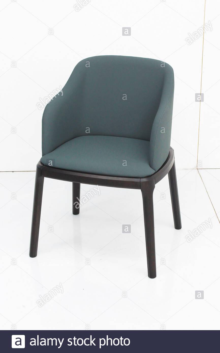 white upholstered armchair