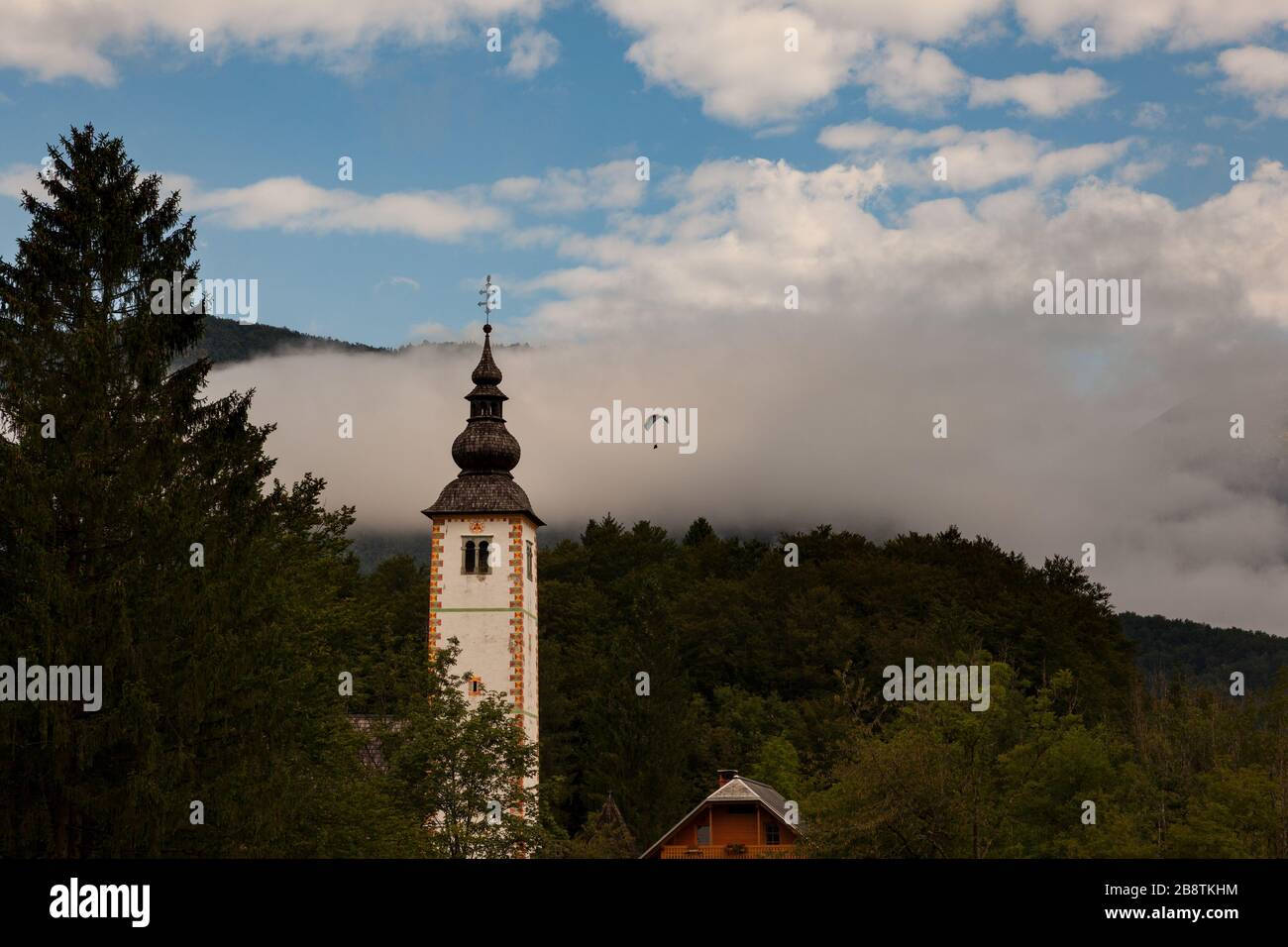 Bell tower of St John the Baptist church in Bohinj, Slovenia Stock ...