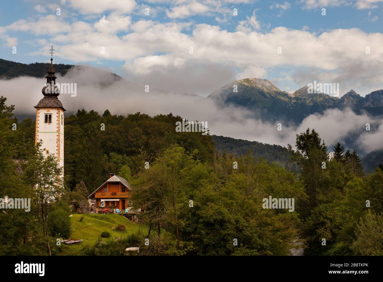 Bell tower of St John the Baptist church in Bohinj, Slovenia Stock ...