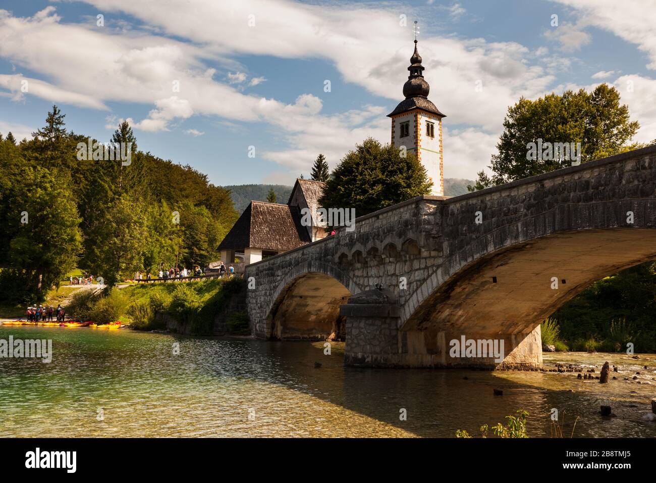 View of Bohinj lake with St John the Baptist church and bridge ...