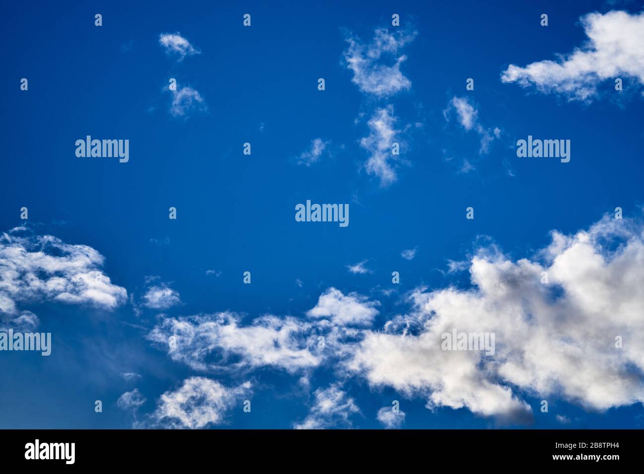 Fantastic soft white clouds against blue sky. Stock Photo