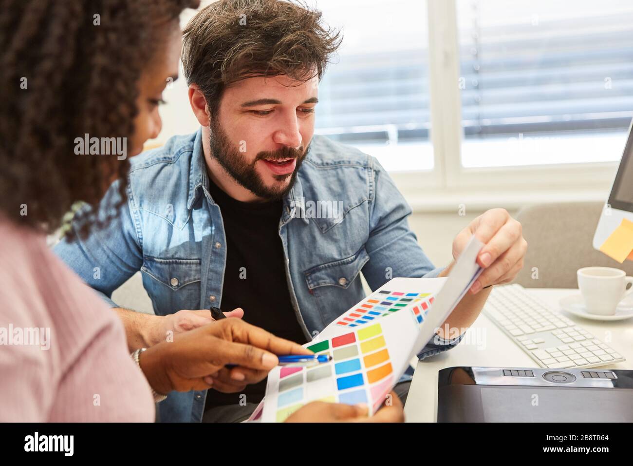 Graphic design team in the selection of colors for the design of a website Stock Photo