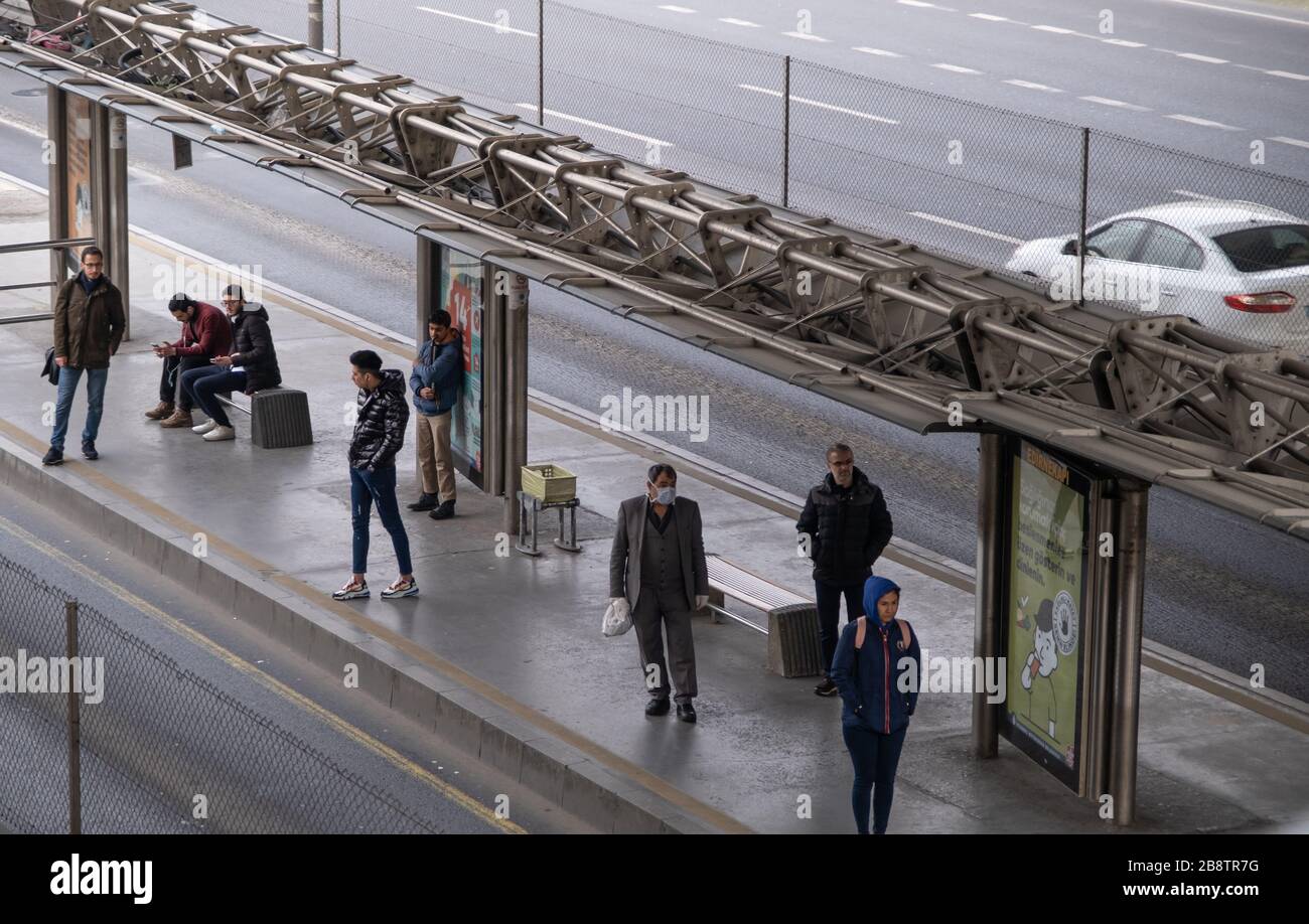 Istanbul, Turkey - 20 March, 2020:  A man wearing face mask to protect from Corona virus (COVID-19) waiting at the bus station. Stock Photo