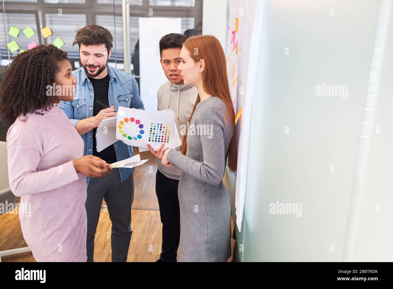 Web designer and graphic designer brainstorming the color design of a website Stock Photo