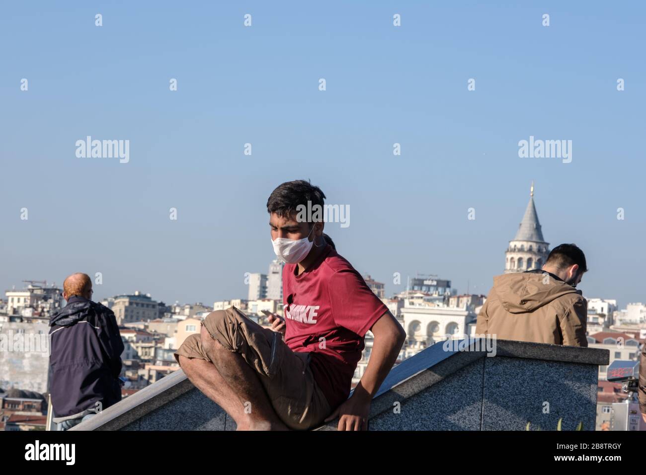 Istanbul, Turkey - 21 March, 2020:  A boy wearing surgical mask to protect from Corona virus (COVID-19) in istanbul. Stock Photo