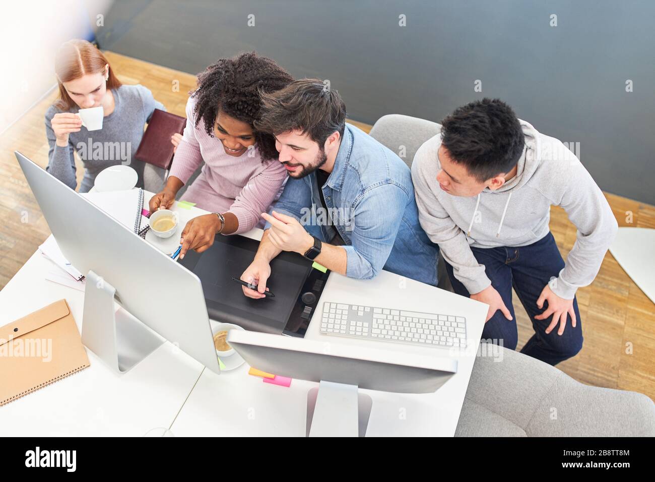 Creative team in an internet agency or web agency works on the computer Stock Photo