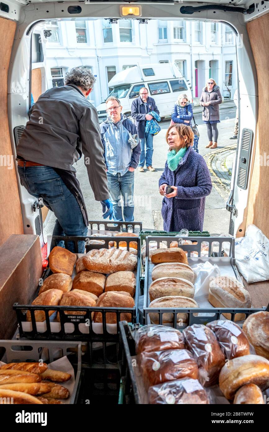Artisan bakers Coburn and Baker, no longer able to supply restaurants in Brighton, have taken to touring neighbourhoods and selling to communities fro Stock Photo