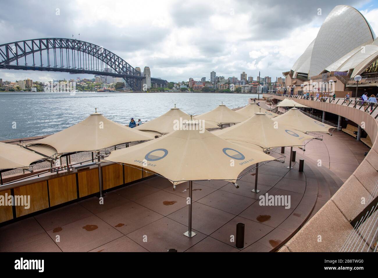 Sydney city centre, Australia. Monday 23rd March 2020. Opera bar shuts up shop at mid day following the ban on pubs and restaurants opening in NSW. Credit Martin Berry/Alamy Live News Stock Photo