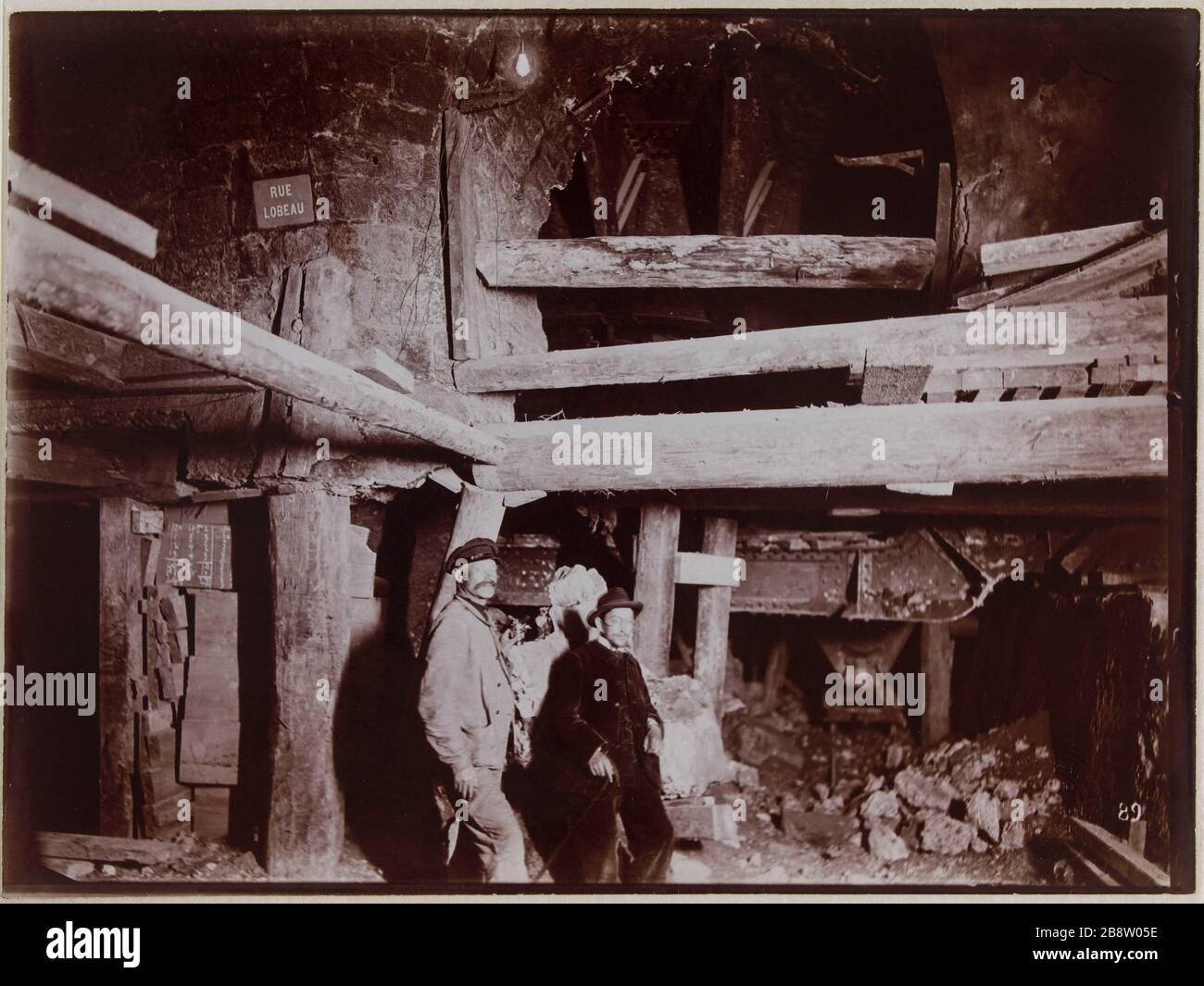 Demolition of Lobau intersection. View of the Progress gallery. 18 May 1899. Demolition of the intersection Lobau. View of the Progress gallery. 4th arrondissement, Paris. May 18, 1899. Construction du métropolitain parisien. 'Démolition du carrefour Lobau. Vue de la galerie d’avancement. Paris (IVème arr.), 18 mai 1899'. Photographie de Charles Maindron (1861-1940). Tirage au gélatino-chlorure d’argent développé. Paris, musée Carnavalet. Stock Photo