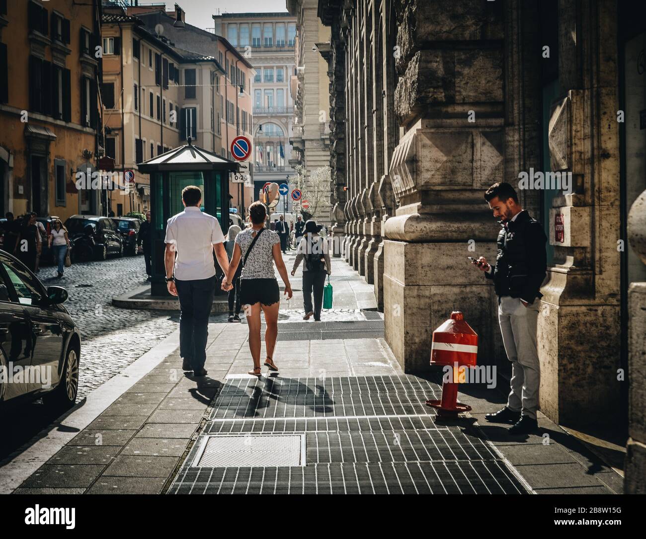 Someone Walking Rome Rome, Italy - Oct 7, 2018. People walking on street in downtown. Rome ...