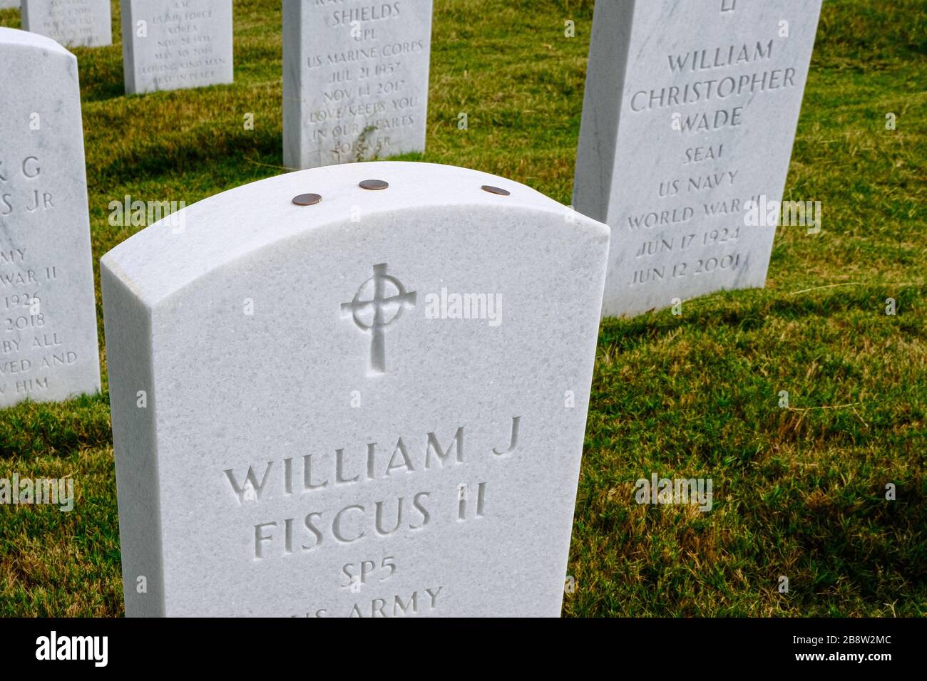 Coins on Army Grave Stock Photo Alamy