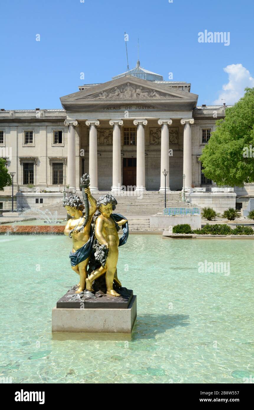 Golden Cherubs Baroque Sculpture & Fountain in front of the Palais de Justice or Law Courts Marseille Provence France Stock Photo