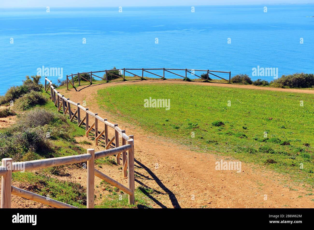 Beautiful path over the sea in Algarve, Portugal Stock Photo