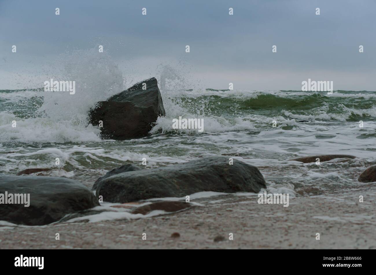 Waves beat on rocky shore hi-res stock photography and images - Alamy