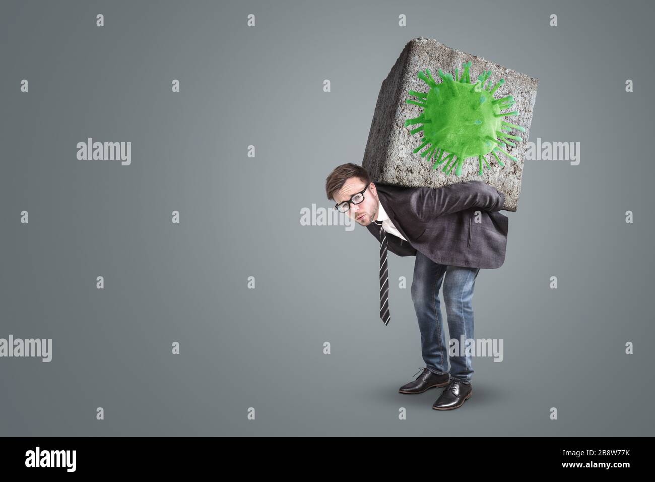 Businessman Under Pressure Caused By A Virus Stock Photo