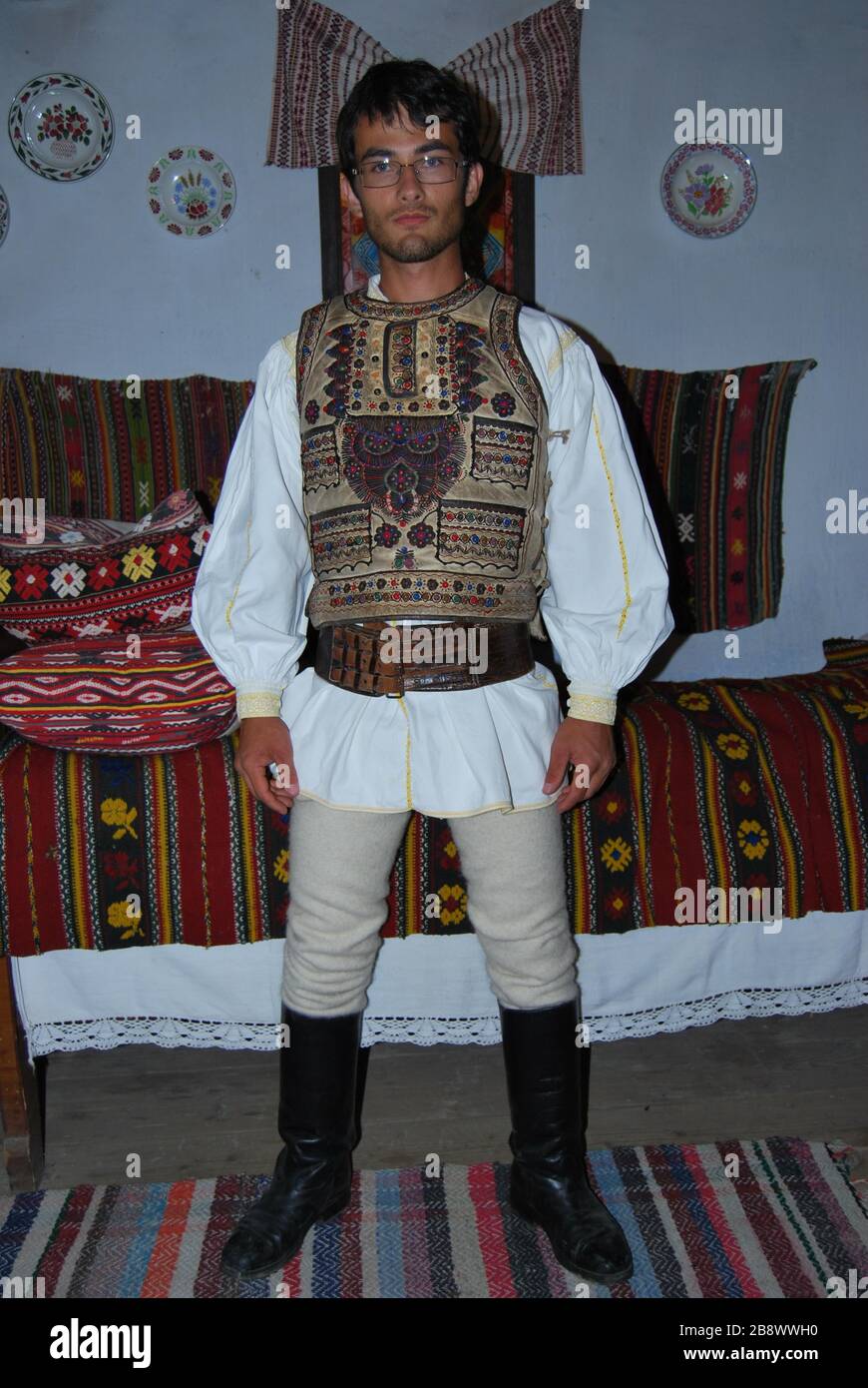 lad in folk costume, Cuciulata (Braşov village, Romania); 26 August 2008;  From ro.wikipedia; description page is/was here; ro:Utilizator:Planck Stock  Photo - Alamy