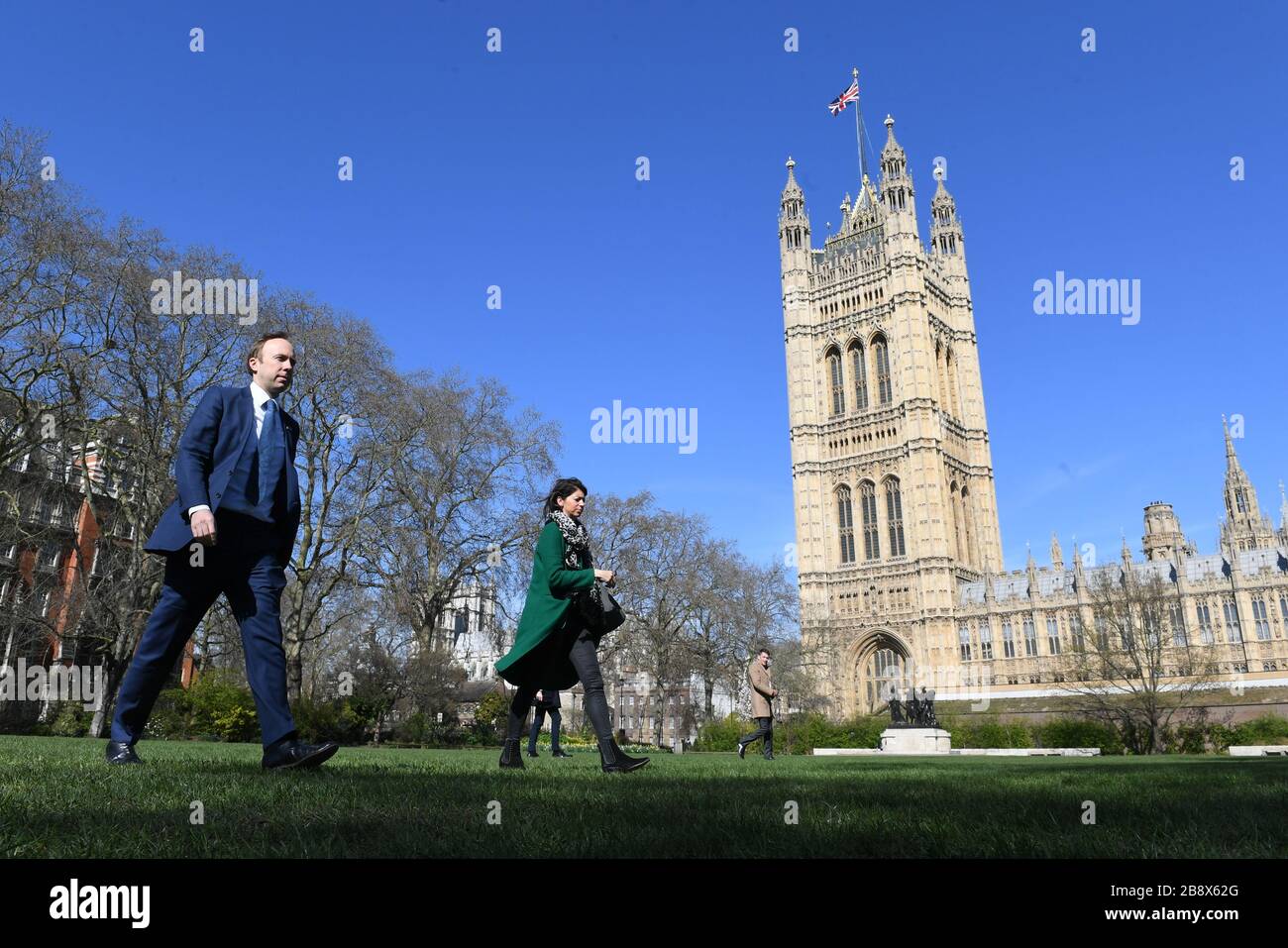 Health Secretary Matt Hancock walks to give interviews in Victoria Tower Gardens, London, as Prime Minister Boris Johnson has said the Government is ready to impose tougher restrictions to curb the spread of the coronavirus if people do not follow the guidance on social distancing. Stock Photo
