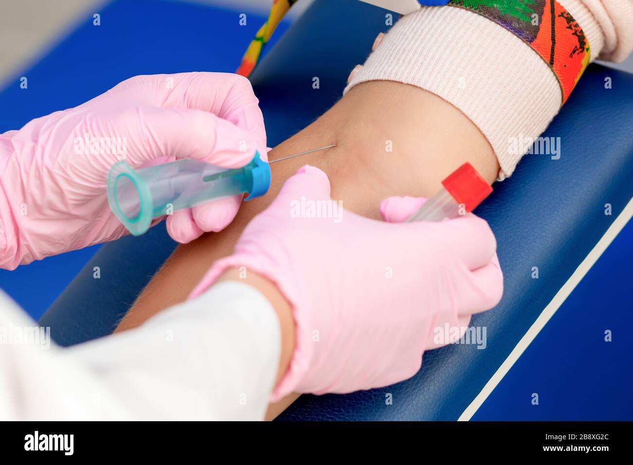 Nurse taking blood sampling from female patient on the analysis Stock ...