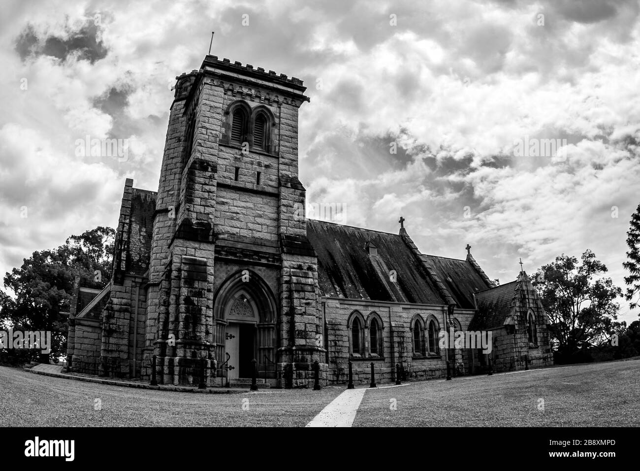 Old stone ancient Catholic Church in Australia. Black and white image ...