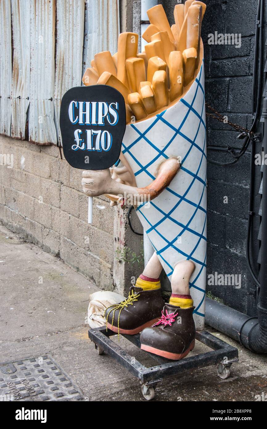 Advertising dummy for take-away chips, Whitstable Harbour, Kent, UK Stock Photo