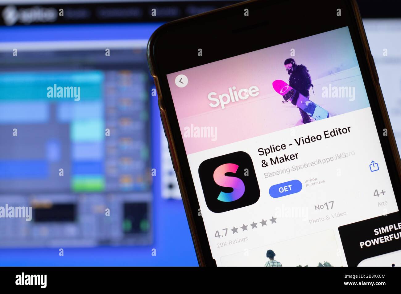 Los Angeles, California, USA - 24 March 2020: Splice app logo on phone screen close up with website on background with icon, Illustrative Editorial Stock Photo