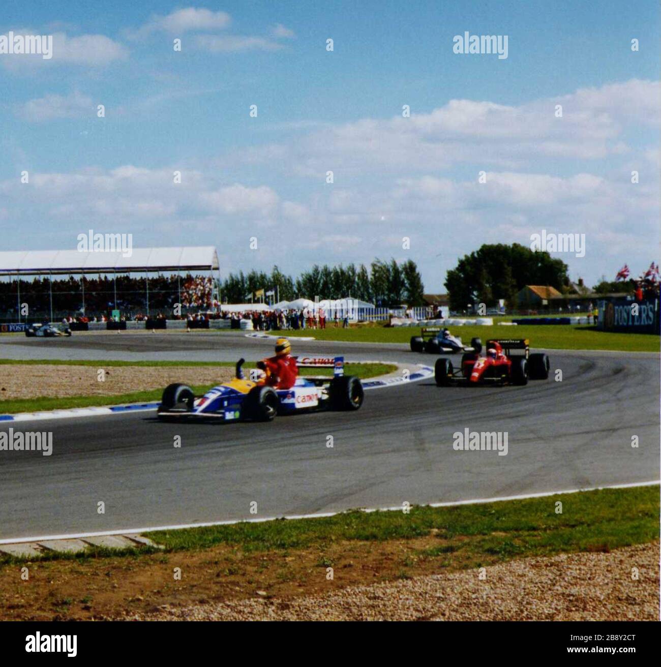 Nigel Mansell Gives Ayrton Senna A Lift Back To The Pits On The Sidepod Of His Williams Fw14 After Senna S Own Mclaren Mp4 6 Ran Out Of Fuel On The Final Lap Alain Nigel Mansell Gives Ayrton Senna A Lift Back To The Pits On The Sidepod Of His Williams Fw14 After Senna S Own Mclaren Mp4 6 Ran Out Of Fuel On The Final Lap Alain