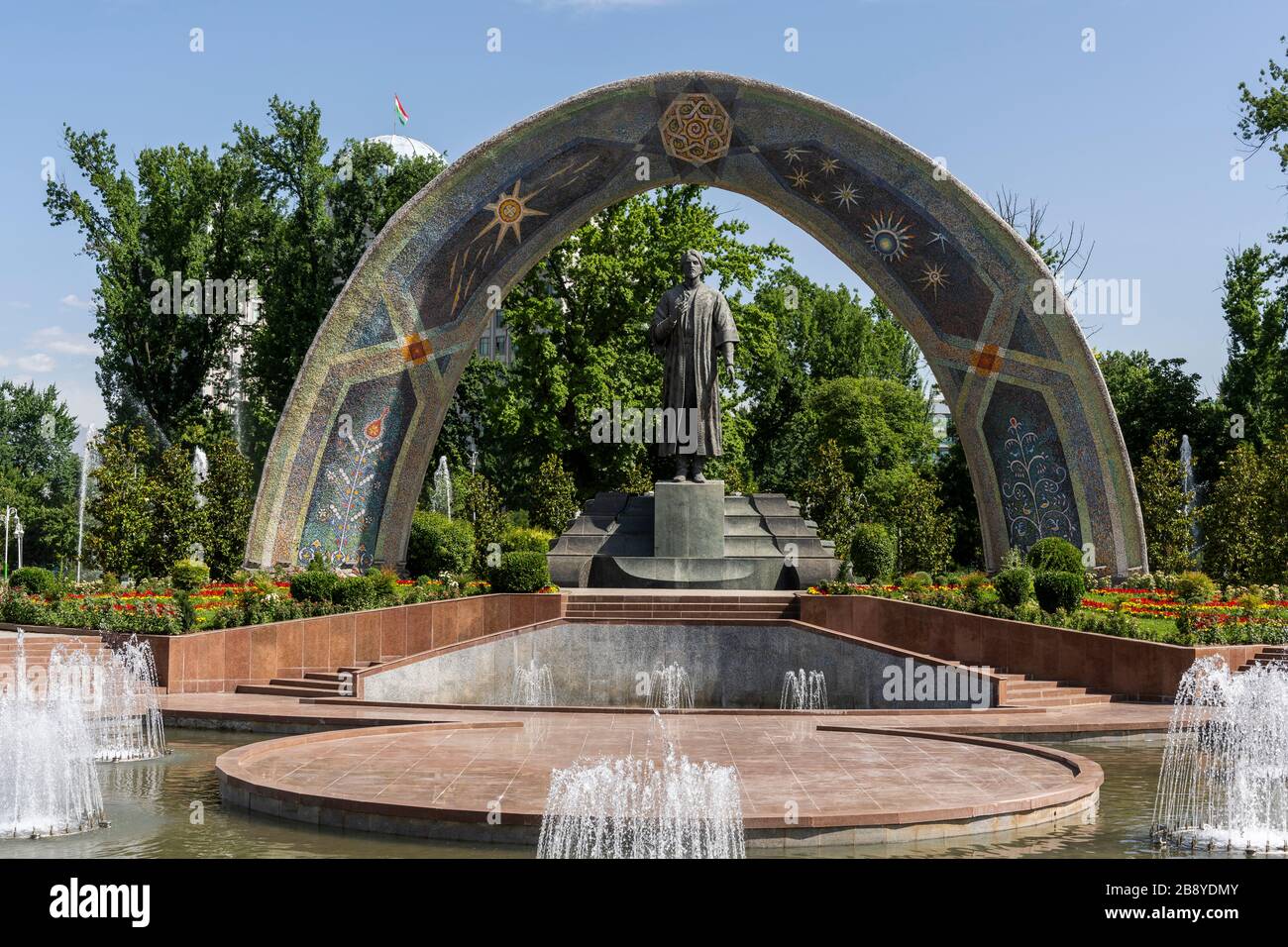 Dushanbe, Tazjikistan - June 14, 2019: Rudaki Park with monument and fountain in the capital of Dushanbe. Stock Photo