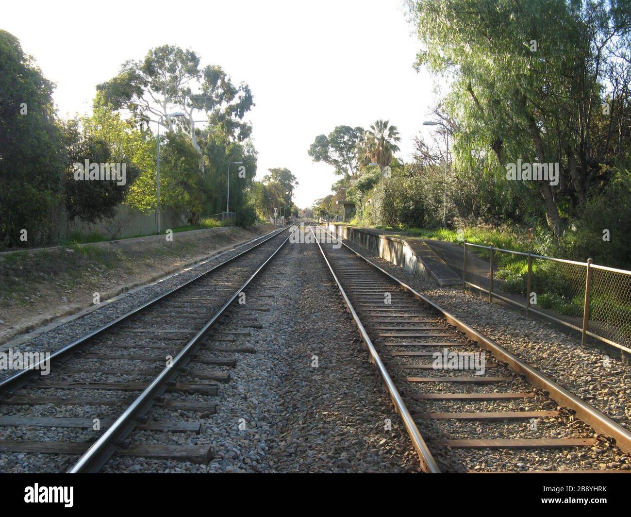 'English: Millswood railway station looking North, Winter 2008. Note: Broad gauge on right on steel sleepers, Standard gauge on left on wooden sleepers; the vast majority of the standard gauge line is on concrete sleepers.; 24 August 2008; My camera, my software and I created this work entirely by ourselves.; Pdfpdf (talk); ' Stock Photo