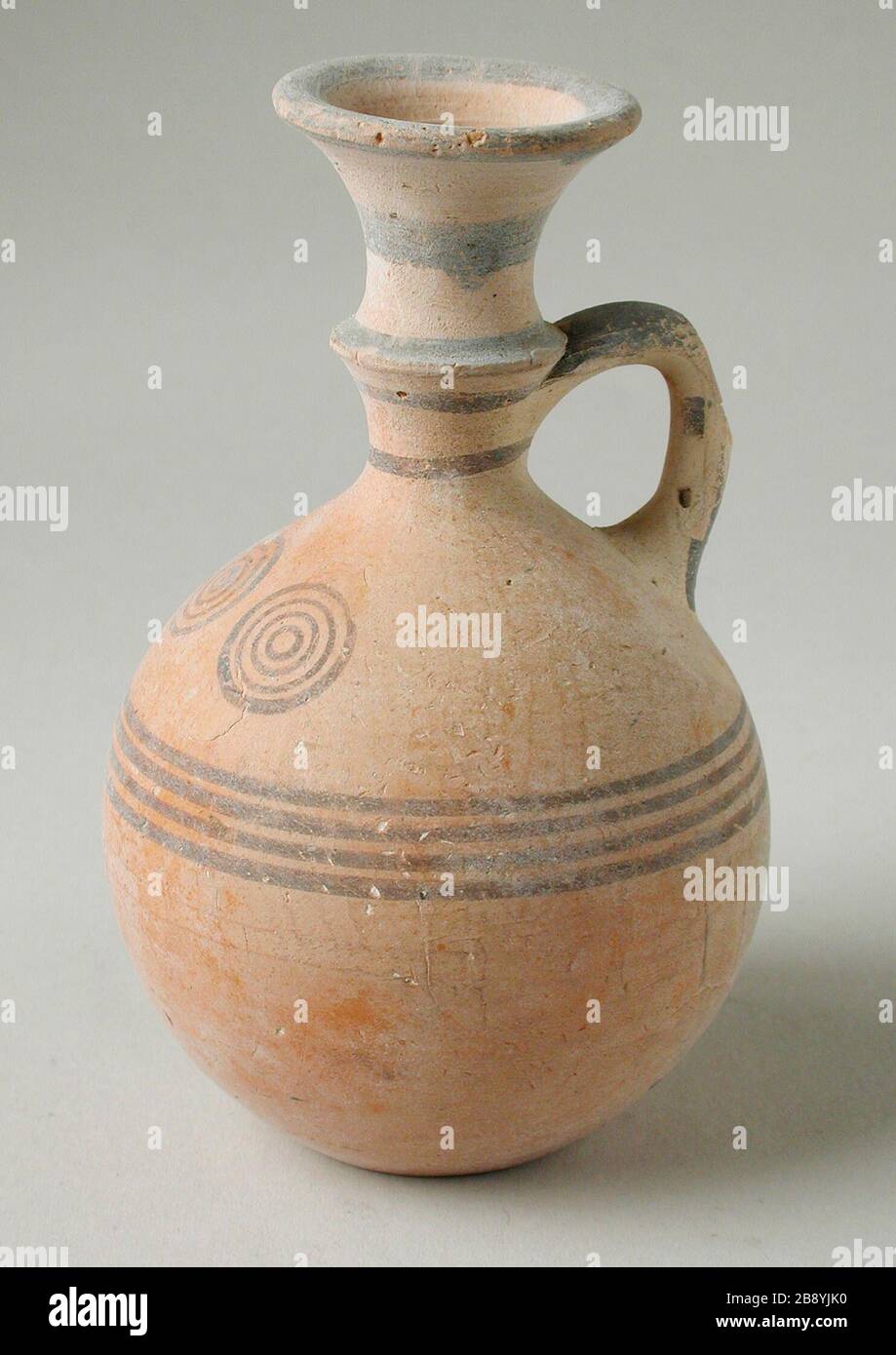 'Miniature Jug; Cyprus, 1350-550 B.C. Furnishings; Serviceware Red terracotta Height: 4 in. (10.16 cm) Gift of Harvey Mudd (M.49.14.18) Art of the Ancient Near East; 1350-550 B.C.; ' Stock Photo