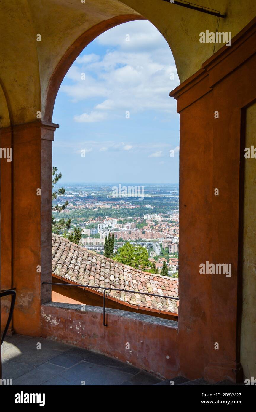 The hills around Bologna as seen through an arch of the 'Madonna di San Luca' sanctuary Stock Photo