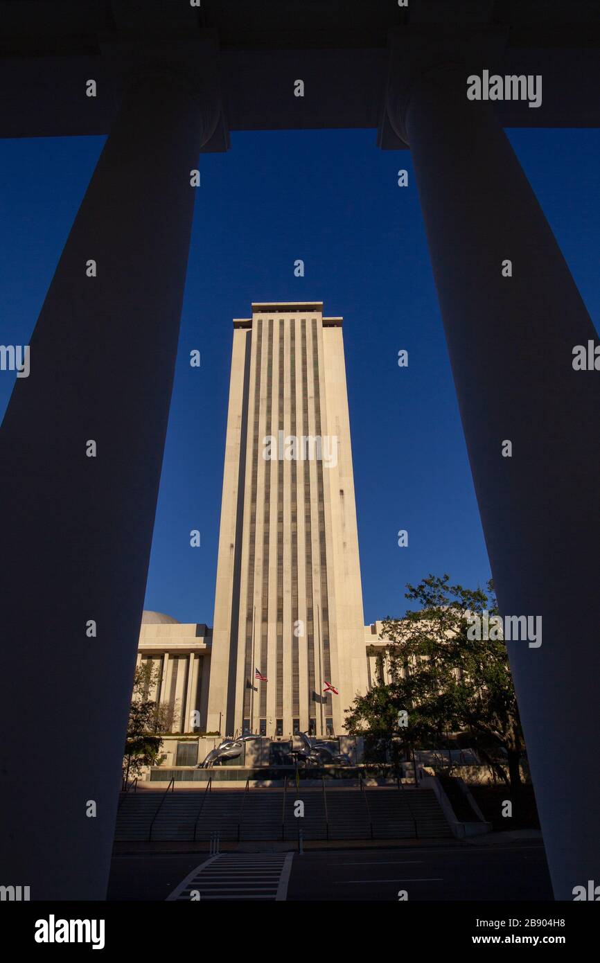The Florida State Capitol building in Tallahassee, Florida framed by the Florida Supreme Court Building. Stock Photo