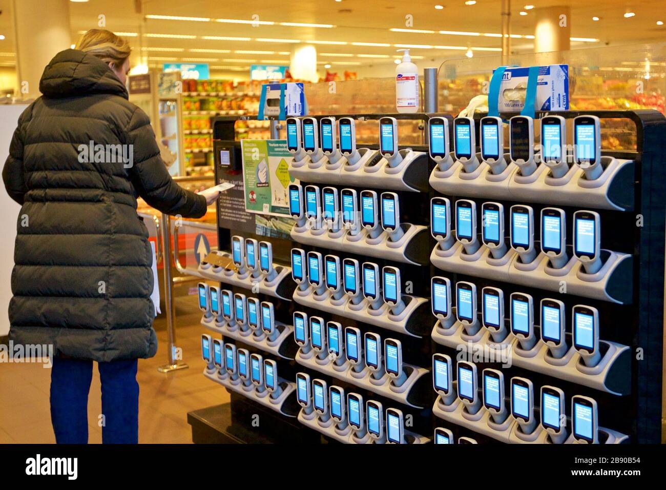 200323) -- HAARLEM, March 23, 2020 (Xinhua) -- Scanners used for payment  are seen at the supermarket Albert Heijn in Haarlem, the Netherlands, March  23, 2020. The Dutch grocery chain Albert Heijn