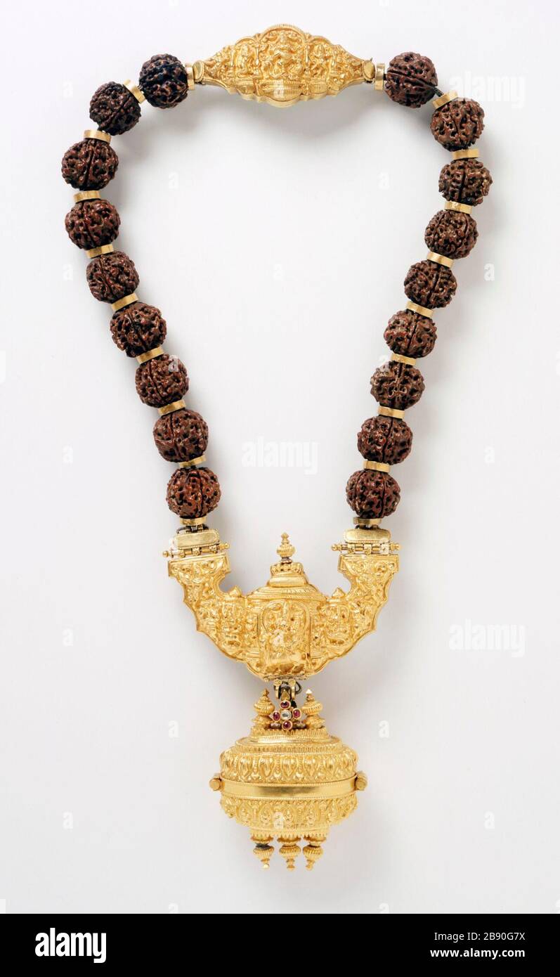 'Necklace with Shiva's Family; English:  India, Tamil Nadu, late 19th century Jewelry and Adornments Gold inlaid with rubies and a diamond; Rudraksha (eye of Rudra/Shiva) beads (elaeo carpus seeds); silver back plate on clasp Purchased with funds provided by Harry and Yvonne Lenart (M.85.140) South and Southeast Asian Art Currently on public view: Ahmanson Building, floor 4; Late 19th century; ' Stock Photo