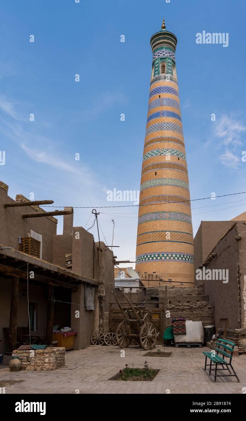 Islom Hoja  (Islam Khoja) minaret in the centre of the old town of Khiva in Uzbekistan. Stock Photo